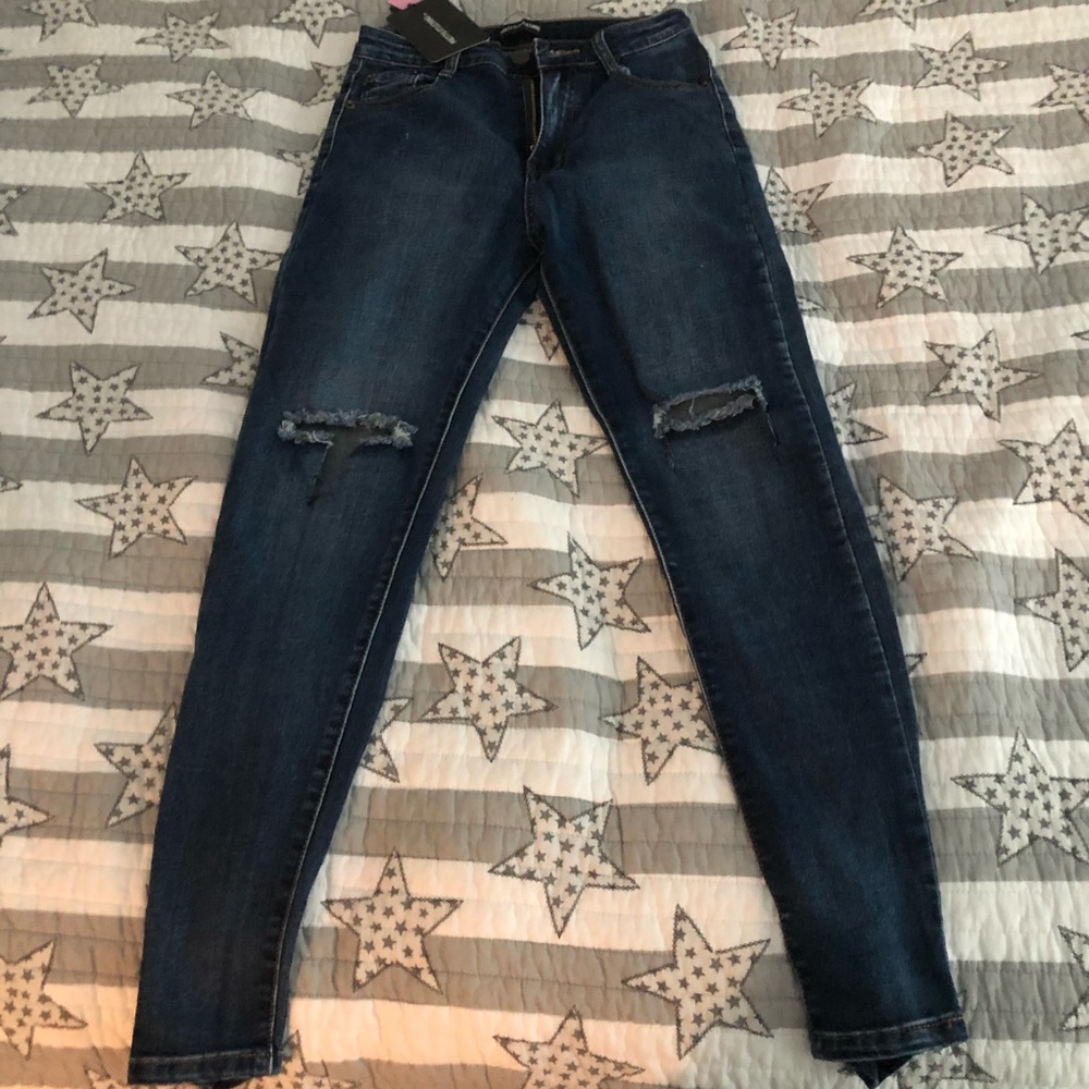 Mid rise jeans with slits NEW **
